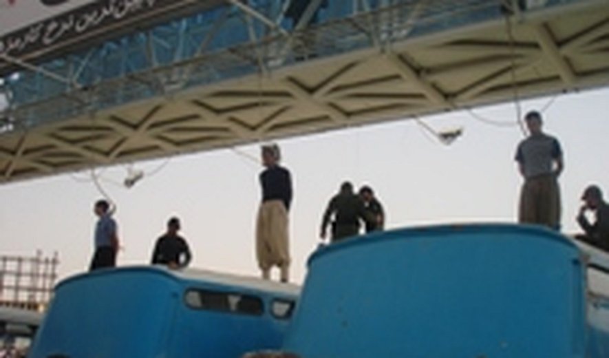 Three young men hanged in public in western Iran this morning