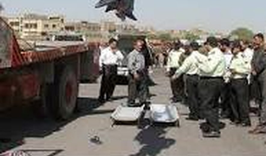 Two brothers were hanged publicly in western Iran today