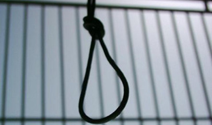 Three men and one woman were hanged in Tehran today