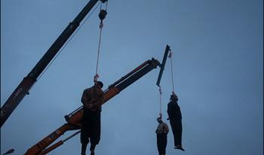 Three young men were hanged in public in northern Iran today